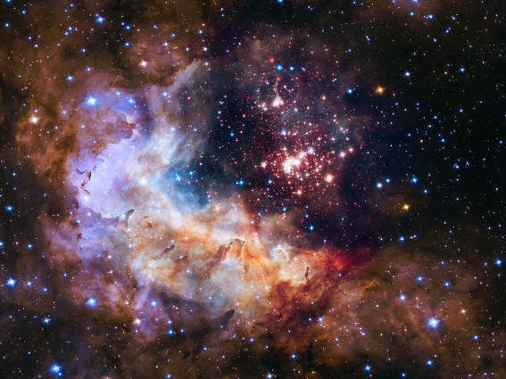 A bright cluster of stars and glowing gas.