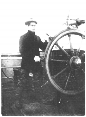 William Hope Hodgson at the wheel of a ship