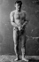 Harry Houdini in chains prior to an escape act.